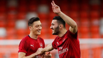 Arsenal soccer stars Mesut Ozil and Sead Kolašinac targeted by knife-wielding carjackers in London