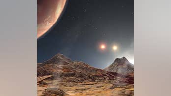 Distant alien planet with three red suns discovered