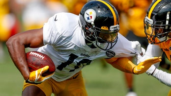 Pittsburgh Steelers' JuJu Smith-Schuster gifts season tickets to fan who tattooed autograph on head