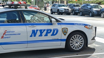 Video shows bystanders coming to aid of NYPD officer who had finger stuck in trunk