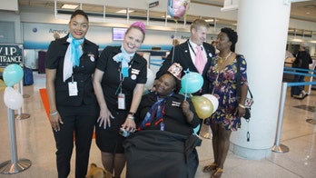 Teen headed for life-saving surgery gets surprise celebration from American Airlines flight crew
