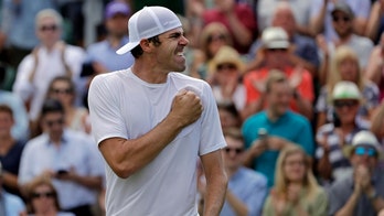 Reilly Opelka, 21, upsets three-time Grand Slam champion Stan Wawrinka at Wimbledon