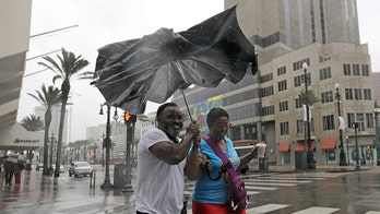 Barry makes landfall in Louisiana after weakening back to tropical storm