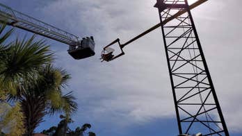 Thrill-seeker rescued from 55 feet in the air after ‘Vomatron’ ride loses power
