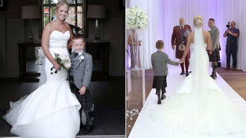 Bride walks down aisle and dances with son who has 'life-limiting' heart defect: 'Literally everyone started crying'