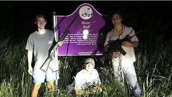 Gun-toting frat brothers pose in front of Emmett Till memorial, may face federal charges