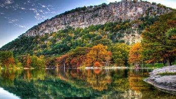 Photo-bomber flashes bare chest in background of grieving family at state park, Texas family says