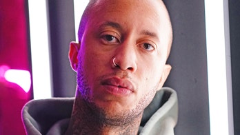 Kim Kardashian photographer Marcus Hyde accused of trying to bribe model for nudes