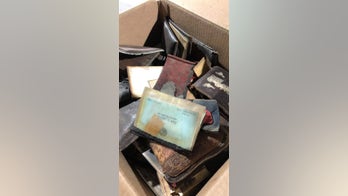 Woman's stolen wallet discovered in vent with 14 others at old Illinois high school 75 years later