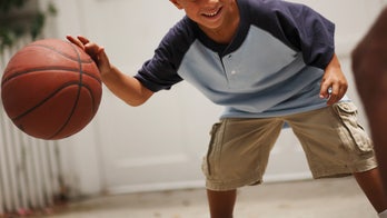 Mom shocked to find police at house – playing basketball with her sons