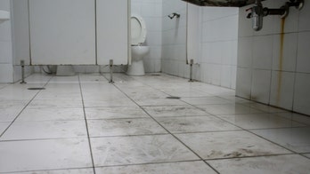 Should you use toilet seat covers in public bathrooms?