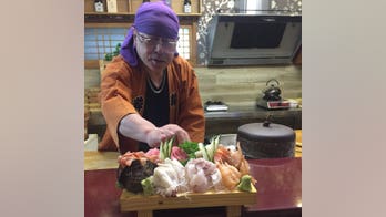 Kim Jong Un's former chef feared detained for 'betrayal' pictured making sushi for UK ambassador