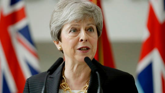 British ambassador who called Trump 'inept' has Theresa May's 'full support'