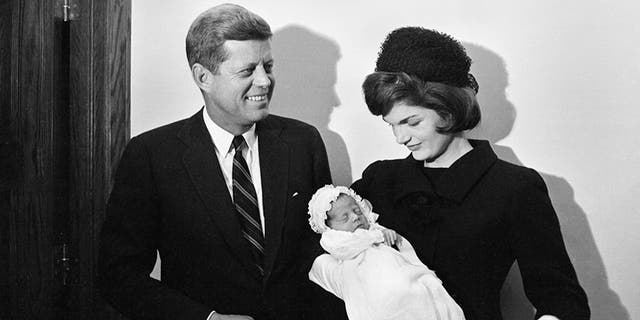 President John F. Kennedy and first lady Jacqueline Kennedy are seen with their newborn son, John F. Kennedy Jr.