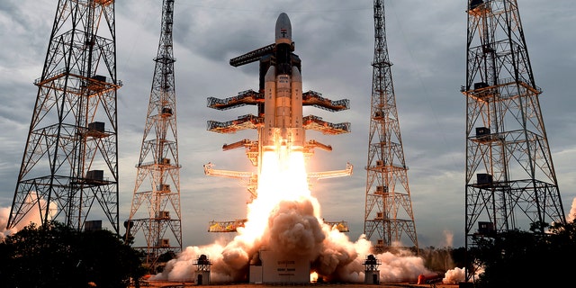 On July 22, 2019, a photo published by the Indian Space Research Organization (ISRO) shows its MkIII Geosynchronous Satellite Launch Vehicle (GSLV) carrying Chandrayaan-2 taking off from the Satish Dhawan Space Center in Sriharikota, India.