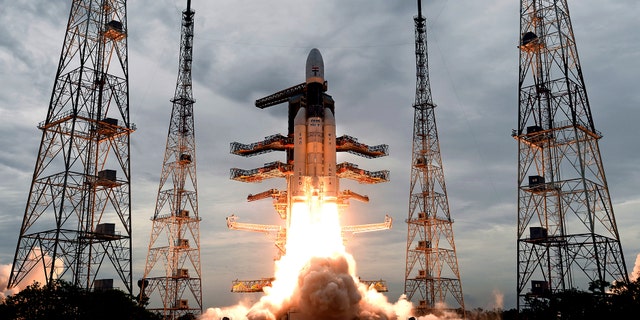 This July 22, 2019, photo released by the Indian Space Research Organisation (ISRO) shows its Geosynchronous Satellite launch Vehicle (GSLV) MkIII carrying Chandrayaan-2 lift off from Satish Dhawan Space center in Sriharikota, India.