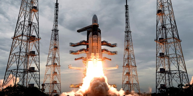 On July 22, 2019, a photo published by the Indian Space Research Organization (ISRO) shows its MkIII Geosynchronous Satellite Launch Vehicle (GSLV) carrying Chandrayaan-2 taking off from the Satish Dhawan Space Center in Sriharikota, India.