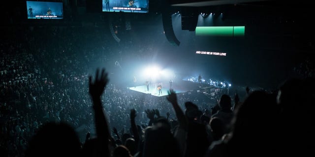 High school students worship during Forward Conference 2019 at the Infinite Energy Center in Duluth, Ga.