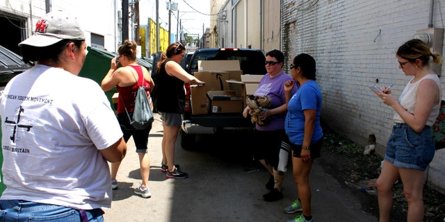 Abby Johnson and others getting ready to unload supplies at the respite center in McAllen, Texas.