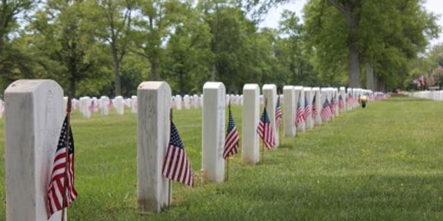 American flags from a veterans cemetery were found burned on July 5, according to police