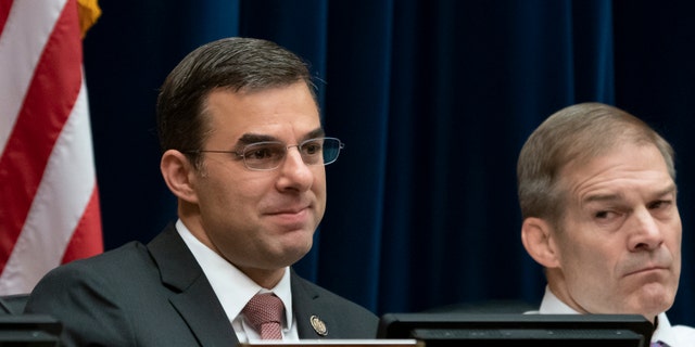 Rep. Justin Amash, R-Mich., left, joined at right Rep. Jim Jordan, R-Ohio, the ranking member, by votes with Democrats on the House Oversight and Reform Committee to subpoena presidential counselor Kellyanne Conway for not appearing before the panel after allegations that she repeatedly violated the Hatch Act. (AP Photo/J. Scott Applewhite)