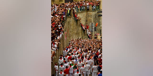 Around 1 million people each year attend the running of the bulls' nine-day festival.
