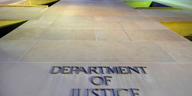 FILE: The Department of Justice headquarters building in Washington early in the morning.