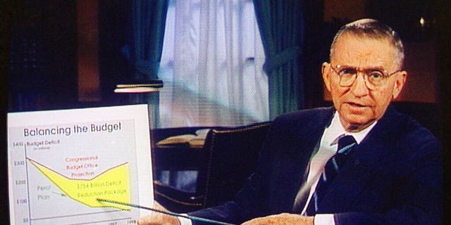 FILE: Ross Perot is shown on a screen in a paid 30-minute television commercial, during a media preview in Dallas. 