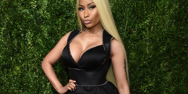 FILE - This Nov. 6, 2017 file photo shows Nicki Minaj at the 14th Annual CFDA Vogue Fashion Fund Gala in New York. Minaj is pulling out a concert in Saudi Arabia because she says she wants to show support for women’s rights, gay rights and freedom of expression. She was originally scheduled to headline the concert on July 18, 2019. The Human Rights Foundation issued a statement last week, calling for Minaj and other performers to pull out of the show.