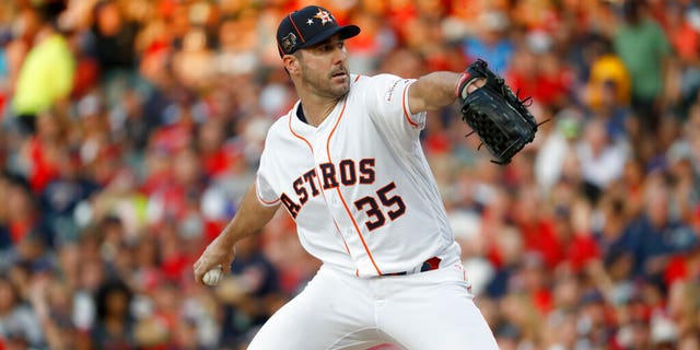 American League starting pitcher Justin Verlander, of the Houston Astros, throws during the first inning of the MLB baseball All-Star Game against the National League, Tuesday, July 9, 2019, in Cleveland.
