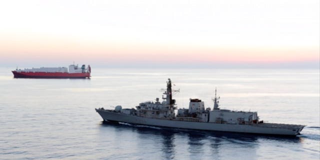 In this image from file video provided by UK Ministry of Defence, British navy vessel HMS Montrose escorts another ship during a mission to remove chemical weapons from Syria at sea off the coast of Cyprus in February 2014. Five Iranian Islamic Revolutionary Guard Corps gunboats tried to seize a British oil tanker in the Strait of Hormuz Wednesday but backed off after a British warship approached, a senior U.S. defense official told Fox News.