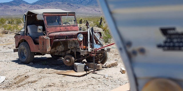 The jeep where Troy Ray was found dead. Officials think it collapsed because of last week's earthquakes. (Rachel Aston / Las Vegas Review-Journal via AP)