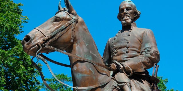 FILE - In this Aug. 18, 2017, file photo, a statue of Confederate Gen. Nathan Bedford Forrest sits in a park in Memphis, Tenn. 