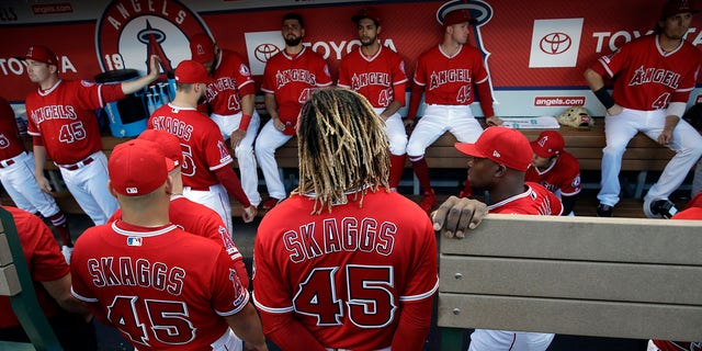 Members of the Los Angeles Angels wear number 45 in honor of their teammate Tyler Skaggs, who died earlier this month, during the team's baseball game against the Seattle Mariners on Friday, July 12, 2019 in Anaheim, California. (Associated Press)