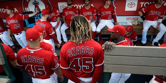 Members of the Los Angeles Angels wear number 45 in honor of their teammate Tyler Skaggs, who died earlier this month, during the team's baseball game against the Seattle Mariners on Friday, July 12, 2019 in Anaheim, California. (Associated Press)