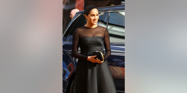 Meghan, Duchess of Sussex, poses for photographers upon arrival at the 'Lion King' European premiere in central London, Sunday, July 14, 2019. (Photo by Joel C Ryan/Invision/AP)