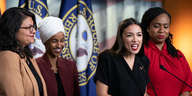 Three of the four members of the "Squad" support the resolution to lower the voting age: Reps.  Tlaib, Ocasio-Cortez and Pressley.  (AP Photo/J. Scott Applewhite)