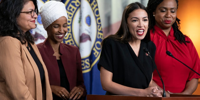 Three of the four members of the "Squad" support the resolution to lower the voting age: Reps. Tlaib, Ocasio-Cortez and Pressley. (AP Photo/J. Scott Applewhite)