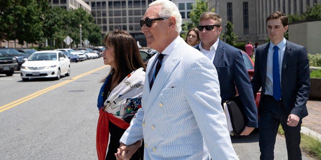 Roger Stone, a longtime confidant of President Donald Trump, accompanied by his wife, Nydia Stone, leaves federal court in Washington, Tuesday, July 16, 2019. (Associated Press)