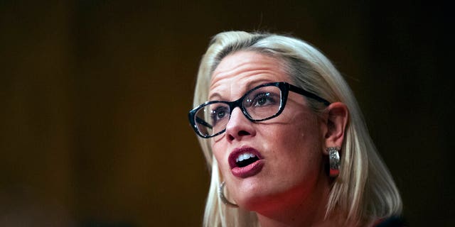 Kyrsten Sinema channels John McCain, gives 'thumbs-down ...