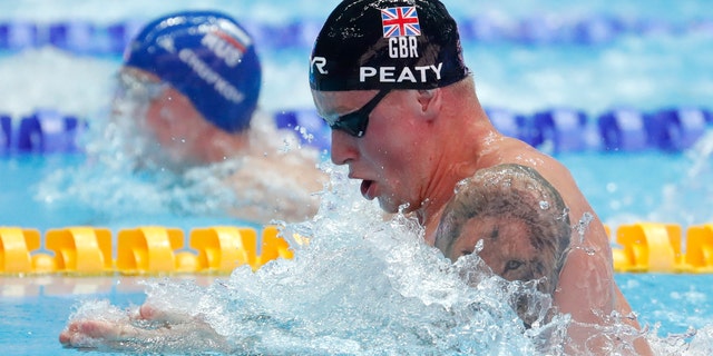 Britain's Adam Peaty swims in his heat of the men's 100m breaststroke at the World Swimming Championships in Gwangju, South Korea on Sunday. (AP Photo/Lee Jin-man)