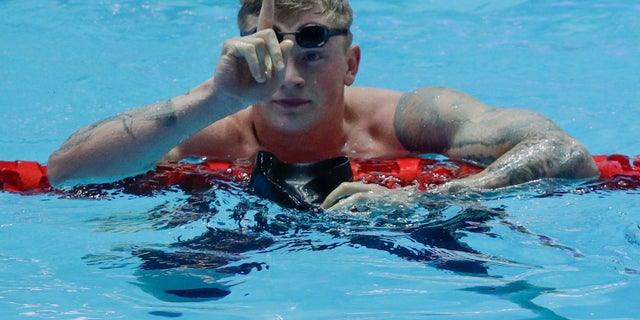 Britain's Adam Peaty gestures after his men's 100m breaststroke semifinal at the World Swimming Championships in Gwangju, South Korea on Sunday. (AP Photo/Mark Schiefelbein)