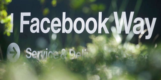 FILE: An address sign for Facebook Way is shown in Menlo Park, Calif.