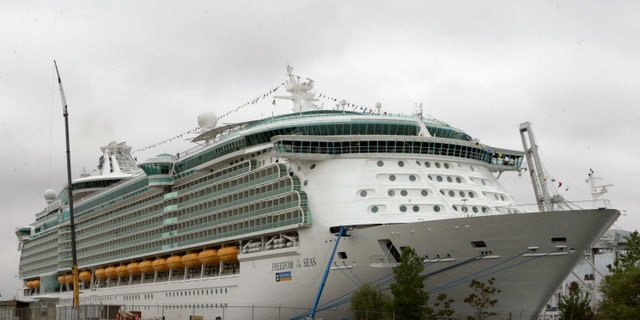 This file photo photo shows the Freedom of the Seas cruise ship docked in New Jersey. Kimberley Wiegand, the mother of an 18-month-old Indiana girl who fell to her death from an open window on the cruise ship in Puerto Rico, told NBC’s “Today” show Monday, July 22, 2019 that her family will sue Royal Caribbean Cruises for “not having a safer situation on the 11th floor of that cruise ship.” (AP Photo/Mike Derer, File)