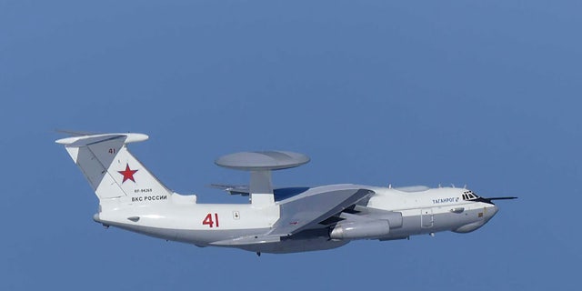 This image released by Joint Staff, Ministry of Defense, shows Russian A-50 airborne early warning and control aircraft flying near the Korean-controlled island called Takeshima in Japanese Tuesday, July 23, 2019. Japan has protested to Russia for allegedly violating Japanese airspace and to South Korea for firing warning shots there. (Joint Staff, Ministry of Defense via AP)