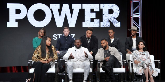 Naturi Naughton, from back row left, Joseph Sikora, Rotimi, Michael Rainey, Jr., Larenz Tate, and from front row left, creator/executive producer Courtney A. Kemp, Curtis "50 Cent" Jackson, Omari Hardwick and Lela Loren participate in the Starz "Power" panel at the Television Critics Association Summer Press Tour