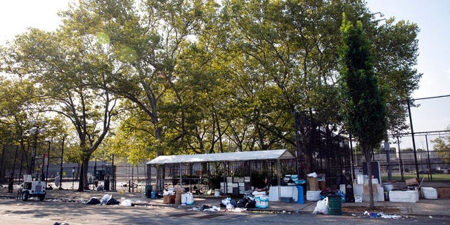 The remains of a party remain litter a playground in the Brownsville neighborhood in the Brooklyn borough of New York on Sunday.