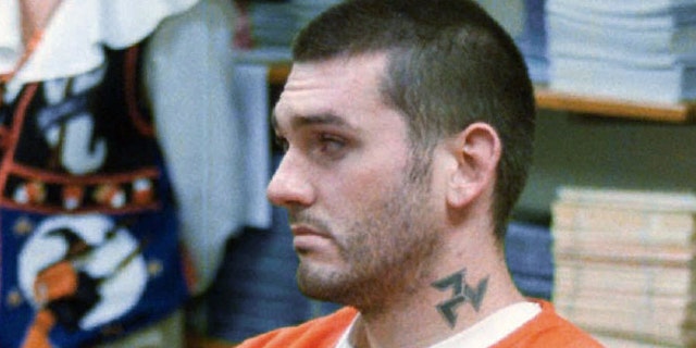 Then murder suspect Danny Lee waits for his arraignment hearing in the Pope County Detention Center in Russellville, Ark., on Friday, Oct. 31, 1997. (AP Photo/The Courier, Dan Pierce, File)