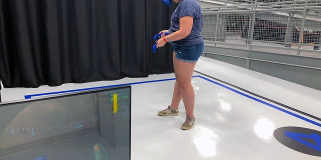 Virtual Reality walk on Mars during the astronaut training experience at Kennedy Space Center. (Photo by Dave Parfitt)