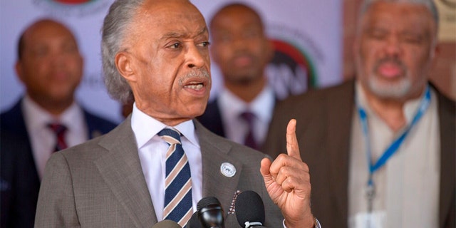 The Rev. Al Sharpton speaks during a press conference at New Shiloh Baptist Church in Baltimore last in July. (Jerry Jackson/The Baltimore Sun via AP)